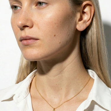 The White Cross Necklace